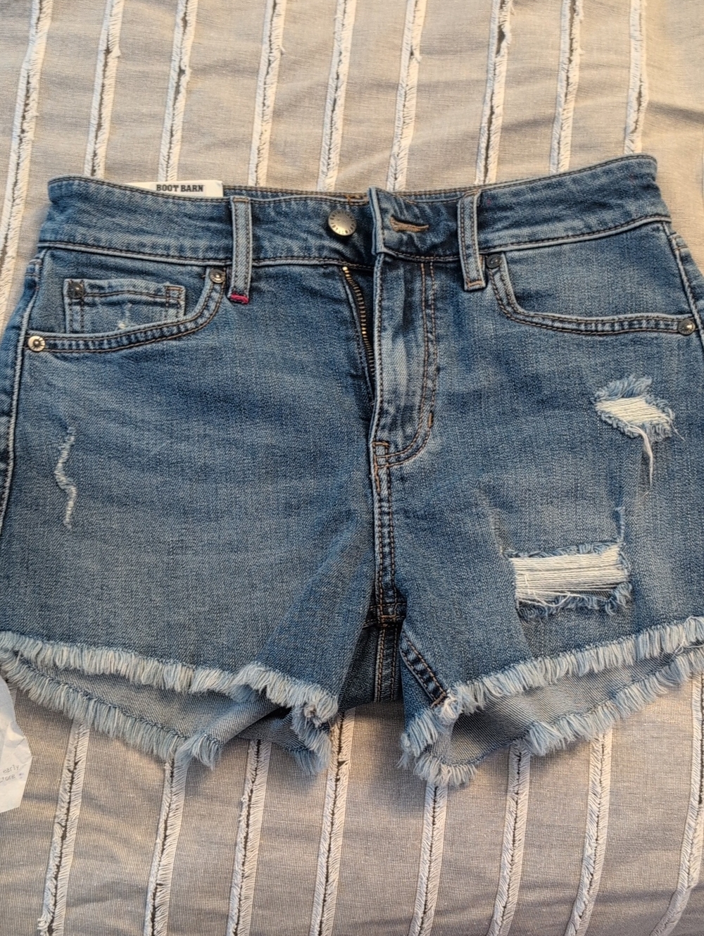 Miranda LambertWomen's Light Blue Distressed Denim Cutoff Shorts